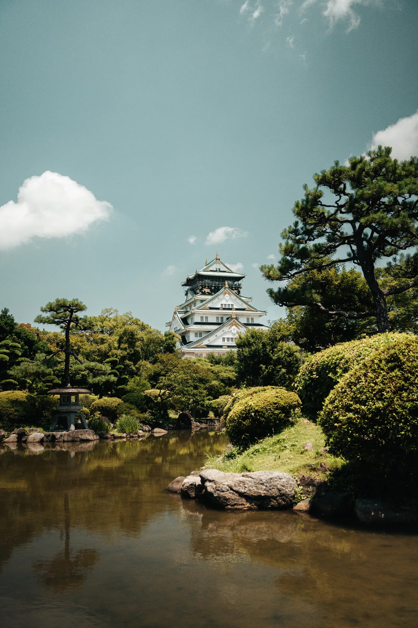 Osaka Castle above a garden pond, Japan